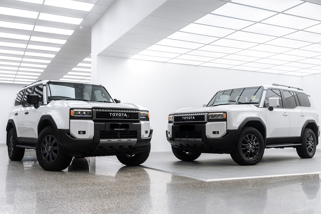 Two Toyota LandCruisers prepared for paint protection at Liquid R